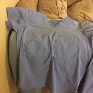 Four used hospital scrubs sets unisex size small